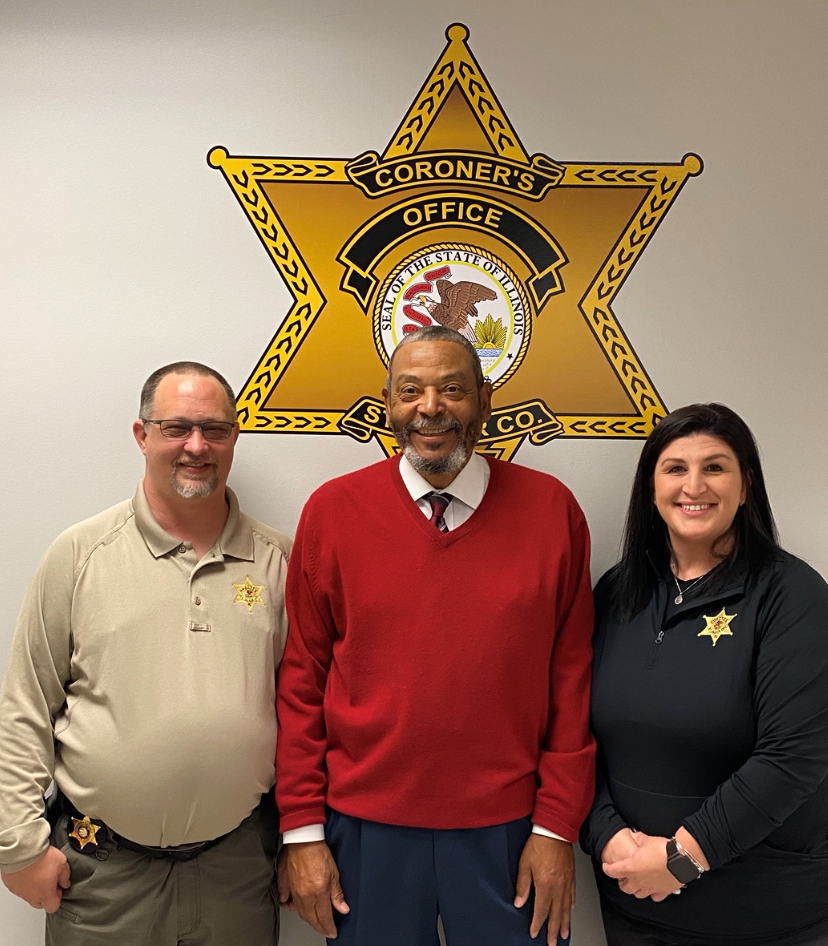 Chief Deputy Dennis Nichols, Coroner Calvin Dye Sr. and Office Manager Tina Sambo Chief Deputy Dennis Nichols, Coroner Calvin Dye Sr. and Office Manager Tina Sambo